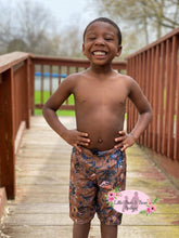 Load image into Gallery viewer, Dino World Swim Trunks