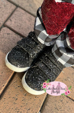 Load image into Gallery viewer, A girl wearing sparkle black tennis shoes
